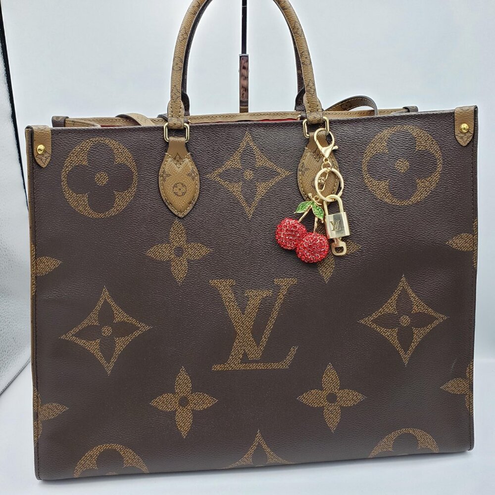 Authentic Louis Vuitton Lock & Key with Unbranded Fruit Charm, Keychain - Picture 3 of 10